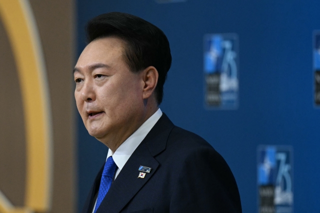 South Korean President Yoon Suk Yeol speaks to the press during the NATO 75th anniversary summit at the Walter E. Washington Convention Center in Washington on Thursday. (AFP-Yonhap)