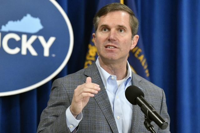 Kentucky Gov. Andy Beshear speaks in the Rotunda of the state Capitol, March 26, in Frankfort, Ky. AP-Yonhap