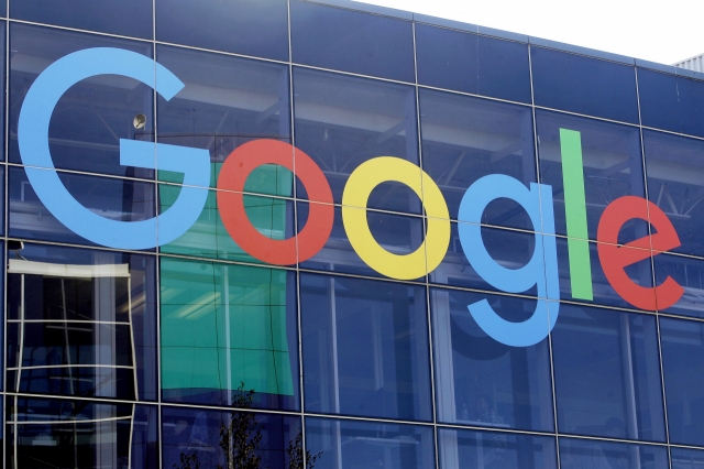 A sign is displayed on a Google building at their campus in Mountain View, California. (AP-Yonhap)