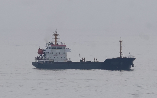 The unflagged cargo ship DE YI is docked in waters near the city of Busan since June 20. (Yonhap)