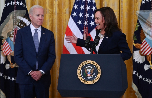 Vice President Kamala Harris (right) speaks as President Joe Biden looks on during an event to mark the passage of the Juneteenth National Independence Day Act, in the East Room of the White House, June 17, 2021, in Washington. (AP)