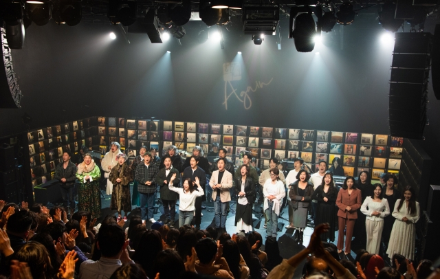 Actors sing during the 16th round of the relay concert performance of 