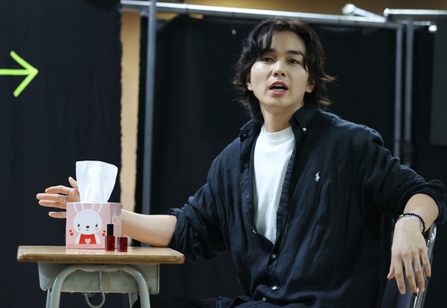 Actor Yoo Seung-ho rehearses a scene from 