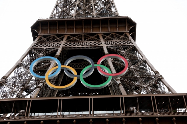 The Olympic Rings are displayed on the Eiffel Tower ahead of the opening ceremony of the Paris 2024 Olympic Games, in Paris, France, on Thursday. (EPA - Yonhap)