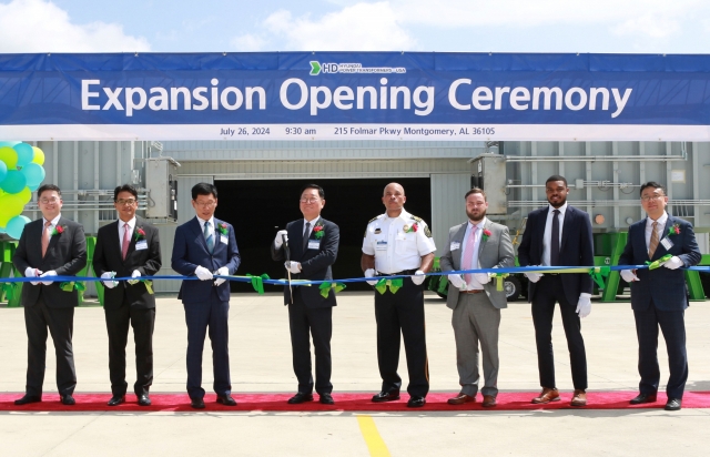 HD Hyundai Electric CEO Cho Seok (center left) and other company and state officials celebrate the expansion of the company's production plant in Alabama on Friday. (HD Hyundai Electric)