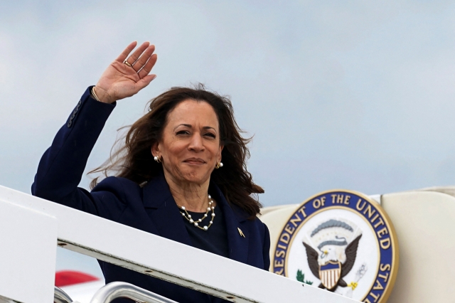 US Vice President and 2024 Democratic presidential candidate Kamala Harris boards Air Force Two as she departs for Houston, Texas, from Joint Base Andrews, Maryland, on Wednesday. (AFP-Yonhap)