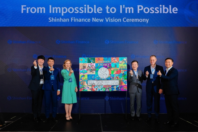 (From right) Shinhan Card CEO Moon Dong-kwon and Aster Group Chairperson Alexey Bakal pose during the inaugural ceremony for the joint venture with Aster Auto held at The Ritz-Carlton, Almaty, Friday. (Shinhan Card)