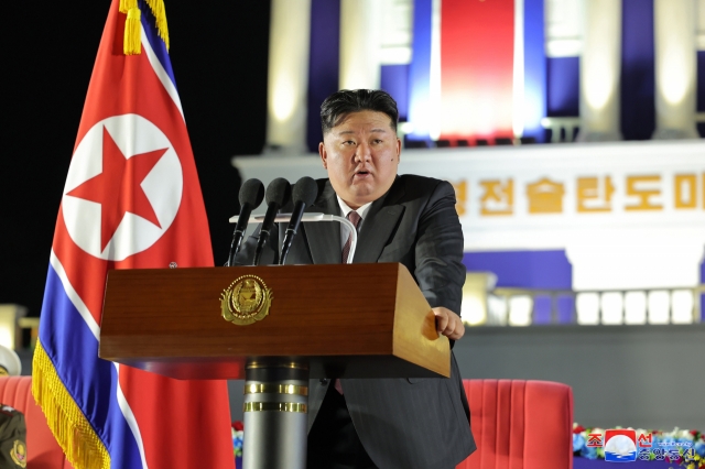 North Korean leader Kim Jong-un delivers a speech during a ceremony to transfer a new tactical ballistic missile weapon system to front-line units taking place in Pyongyang on Sunday, in this photo provided by the North's official Korean Central News Agency. (KCNA)