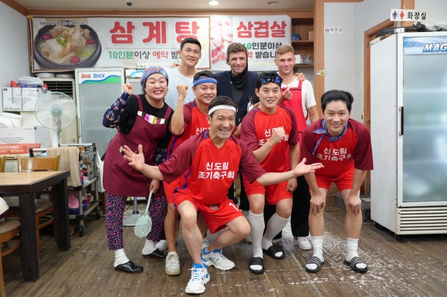 (From left, back row) Kim Min-jae, Thomas Muller, Joshua Kimmich and cast members of 