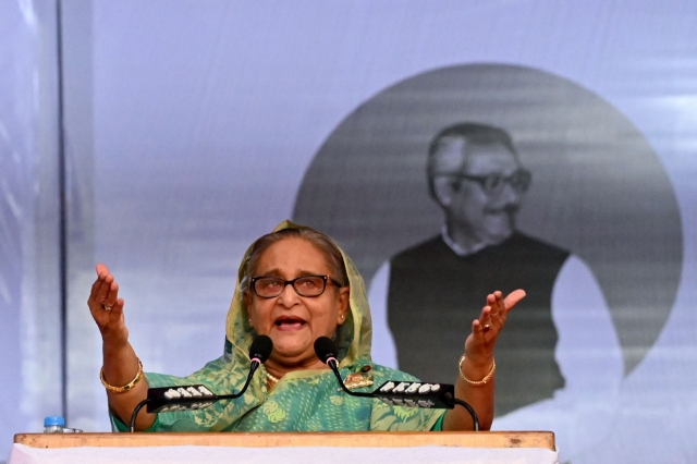 Bangladesh's Prime Minister Sheikh Hasina addresses a rally during an election campaign in Sylhet on December 20, 2023, ahead of the general elections. (AFP)