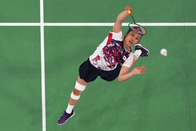 South Korea's An Se-young plays against China's He Bingjiao during their women's singles badminton gold medal match at the 2024 Summer Olympics, on Monday, in Paris, France. (Pool Photo via AP)