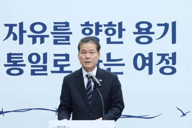 This file photo, provided by the Ministry of Unification on Aug. 1, 2024, shows Unification Minister Kim Yung-ho speaking at a ceremony in Paju, some 40 kilometers northwest of Seoul, to commemorate North Korean defectors who died during their escape. (Yonhap)