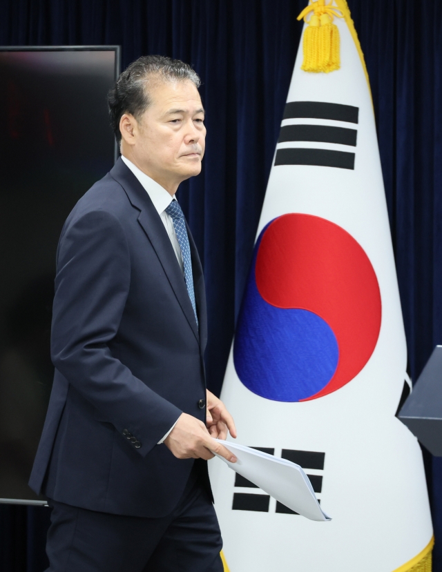 Minister of Unification Minister Kim Yung-ho enters the briefing room of the Government Complex Seoul bin Jongno-gu, Seoul, on Friday. (Yonhap)