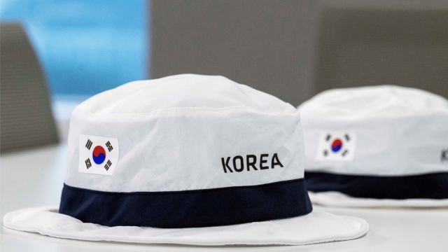 Korean archers at the 2024 Paris Olympics wore hats featuring Hyundai Motor Group's nano-cooling film technology. The company has been a long-time financial supporter of the Korea Archery Association. (Hyundai Motor Group)