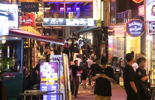 Pedestrians walk around World Food Street in Itaewon at Yongsan-gu, central Seoul. (Yongsan-gu Office)