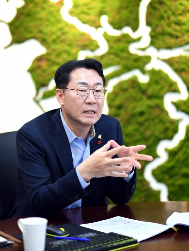 Hwaseong Mayor Jeong Myeong-geun discusses plans for the city's future development during an interview in his office. (Hwaseong City)