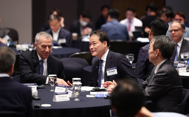 South Korean Unification Minister Kim Yung-ho (center), US Ambassador to South Korea Philip Goldberg (left) and Japan's new Ambassador to South Korea Koichi Mizushima attend a forum marking the first anniversary of the Camp David trilateral summit on Wednesday at the Korea Press Center in Seoul. (Yonhap)