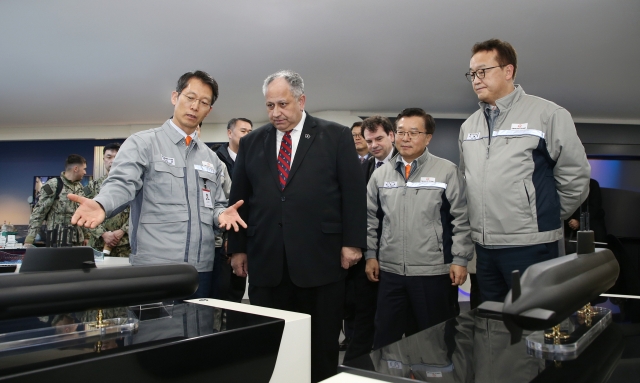 In this file photo, US Secretary of the Navy Carlos Del Toro (second from left) visits Hanwha Ocean and gets briefed on the Korean shipbuilder's capabilities on February 27, 2024. (Hanwha Ocean)