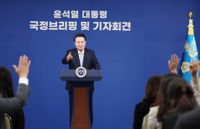 President Yoon Suk Yeol takes reporters' questions during a news conference after a state affairs briefing at the presidential office in Seoul on Thursday. (Yonhap)