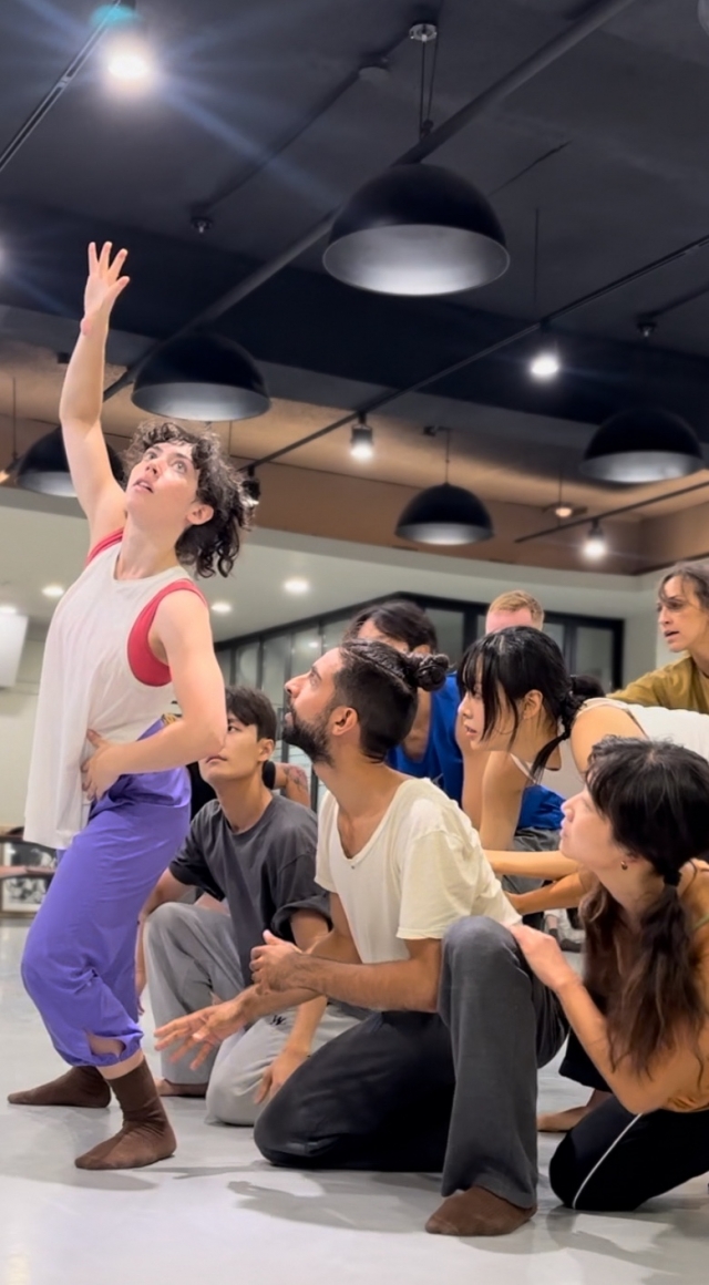 Dancers rehearse a scene from 