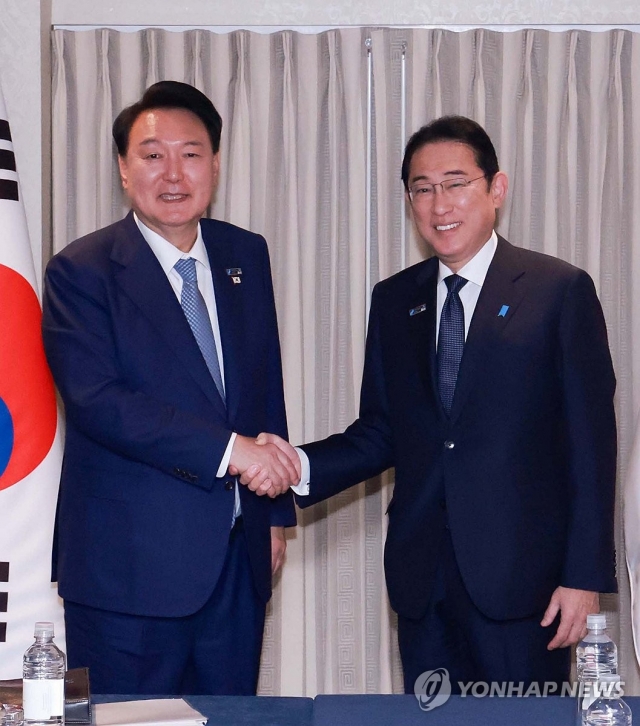 President Yoon Suk Yeol (left) and Japanese Prime Minister Fumio Kishida shake hands during their meeting in Washington, D.C., in this file photo taken July 10, 2024, on the sidelines of the North Atlantic Treaty Organization summit. (Yonhap)