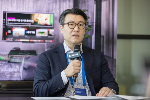 Kim Yong-su, head of the global service business team of visual display division at Samsung Electronics, speaks in a press conference held on the sidelines of the IFA trade show in Berlin, Friday. (Samsung Electronics)