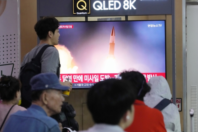 A TV screen shows a file image of North Korea's missile launch during a news program at Seoul Railway Station in Seoul, South Korea, on Thursday. (AP)