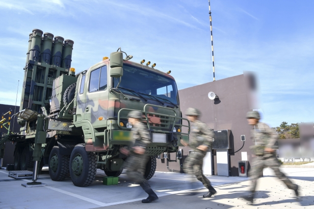 Soldiers rush to the Cheongung-II's launcher during a drill held at an Air Force's unit in North Gyeongsang Province on March 19, 2024, in this file photo provided by the Air Force. (Newsis)