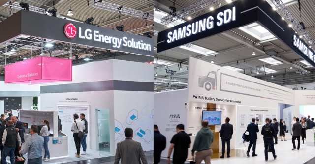 Visitors check out the exhibition booths of LG Energy Solution (left) and Samsung SDI at IAA Transportation 2024 in Hanover, Germany (provided by each company)