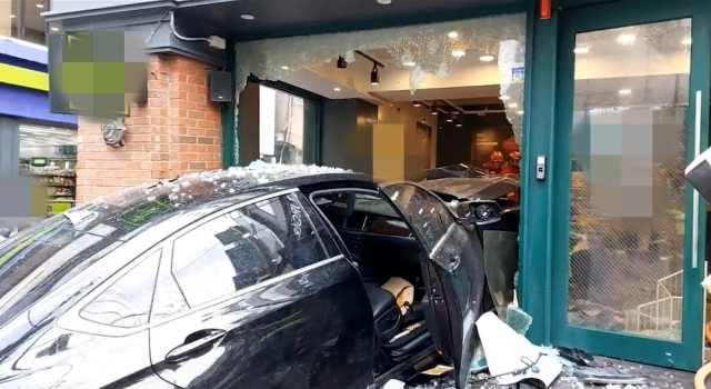 The car is seen rammed into a restaurant in Mia-dong, Gangbuk-gu, in western Seoul Friday morning. (Yonhap)