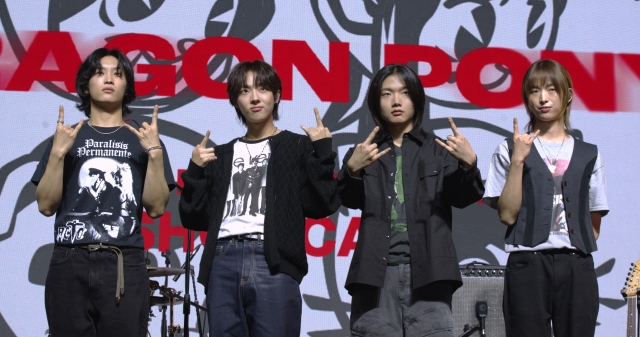 From left: Dragon Pony members bassist Pyun Sung-hyun, vocalist An Tae-gyu, drummer Ko Gang-hun and guitarist Kwon Se-hyuk pose for a photo during the press conference held in Mapo-gu, Seoul, Thursday. (Kwon Min-seo/The Korea Herald)