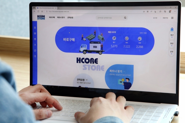 A user navigates Hyundai Steel's e-commerce platform, Hcore Store, which specializes in selling steel products for construction, offering features like real-time inventory tracking, auctions and algorithm-based price matching services. (Hyundai Steel)