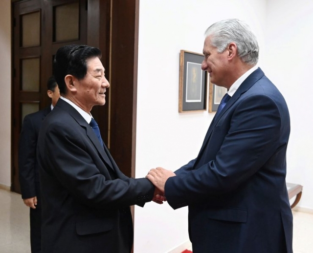 Cuban President Miguel Diaz-Canel meets with North Korea's newly appointed ambassador, Han Su-chol, for their first official meeting on Friday in Havana. (Presidential Office of Cuba)