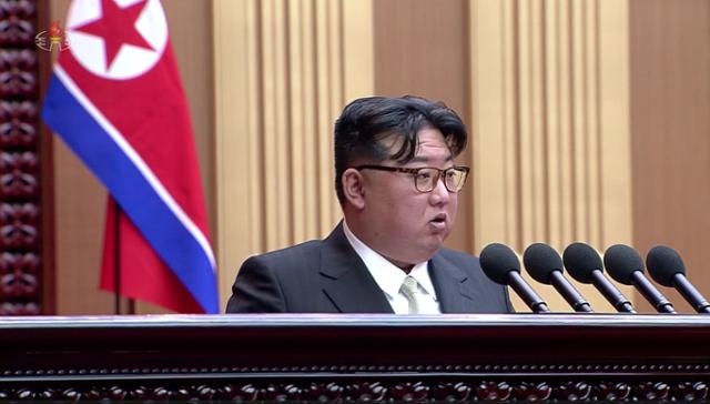 This image, captured from footage of North Korea's state-run Korean Central Television on Jan. 16 shows North Korean leader Kim Jong-un speaking at a Supreme People's Assembly meeting held the previous day in Pyongyang. (KCNA)