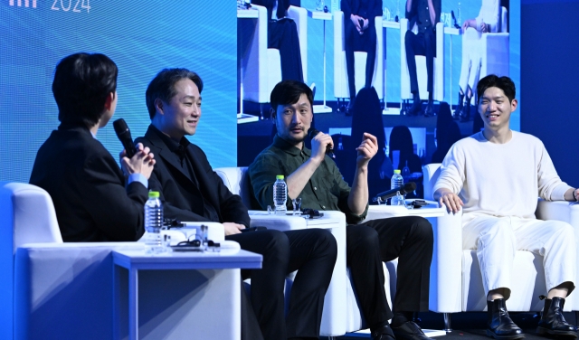 YouTuber GeniusSKLee talks to (from second to the left) Weta FX CG supervisor Choi Jong-jin, Weta FX senior facial modeler Hwang Jung-rock and motion graphic designer Kim Gryun at the Herald Design Forum 2024, held at the Floating Island Convention Center on the Han River, Seoul, Tuesday. (Lim Se-jun/The Korea Herald)