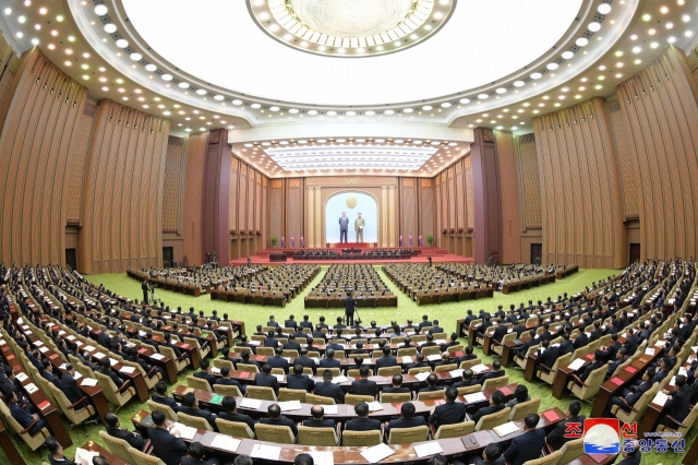 This photo shows the North holding the 11th session of the 14th Supreme People's Assembly in Pyongyang, Tuesday. (KCNA)