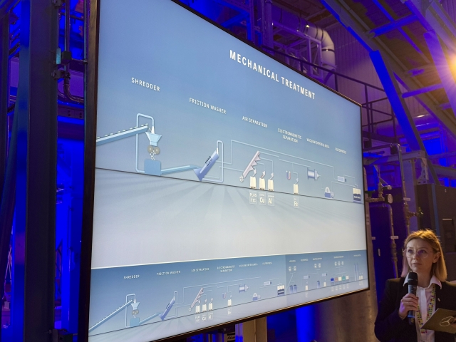 Roxana Maria Truta, Mercedes-Benz’s battery recycling process development manager, stands next to a detailed diagram showcasing the company’s battery recycling process, which uses a combination of mechanical and wet, or hydrometallurgical methods to recover valuable raw materials like copper, aluminum and iron from end-of-life batteries. (Moon Joon Hyun/The Korea Herald)