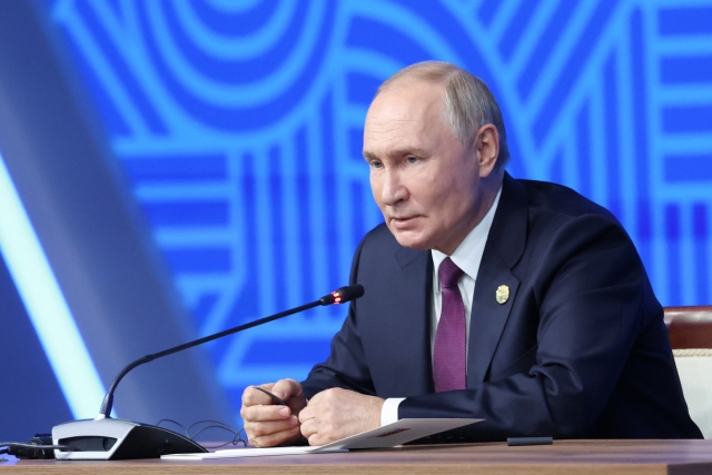 Russia's President Vladimir Putin gives a press conference on the sidelines of the 2024 BRICS Summit at the Kazan Expo International Exhibition Centre in Bolshiye Kabany, Thursday. (TASS-Yonhap)