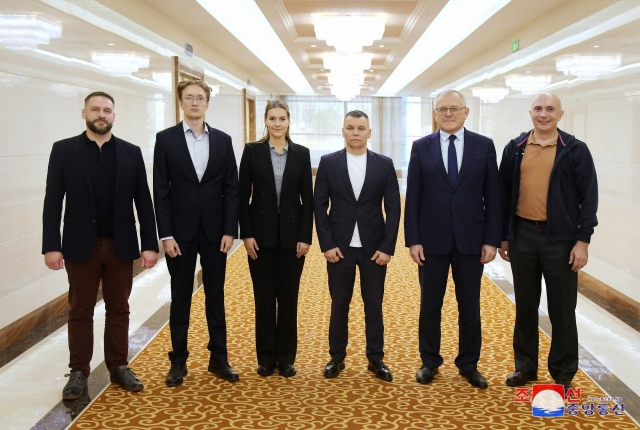 Russia's technology delegation, led by Andrei Zarenin (third from right), vice minister of digital development, communications and mass media, arrives in Pyongyang, in this photo from North Korea's Korean Central News Agency on Tuesday. (Yonhap)