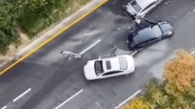 The white car driven by the suspect is seen driving against the traffic toward a motorbike after crashing into other cars near Gangnam Station in southern Seoul, Saturday. (Online community)