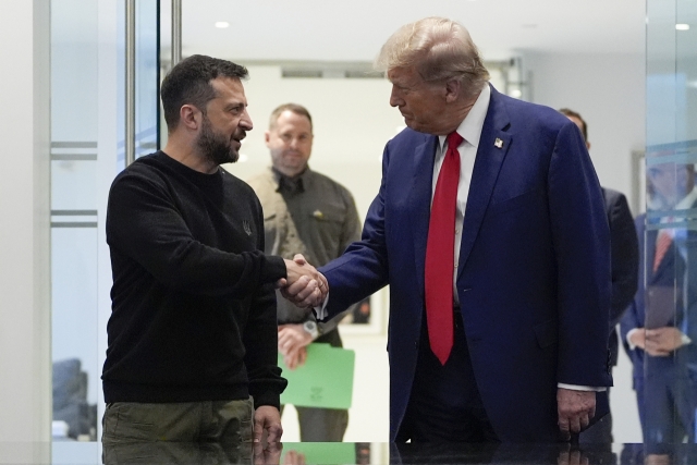 Then-Republican presidential nominee former President Donald Trump (right) and Ukraine's President Volodymyr Zelenskyy shake hands during their meeting at Trump Tower, on Sept. 27, 2024, in New York. (AP)