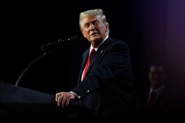 Then-Republican presidential nominee and former US President Donald Trump takes the stage following early results from the 2024 US presidential election in Palm Beach County Convention Center, in West Palm Beach, Florida, on Nov. 6. (Reuters)