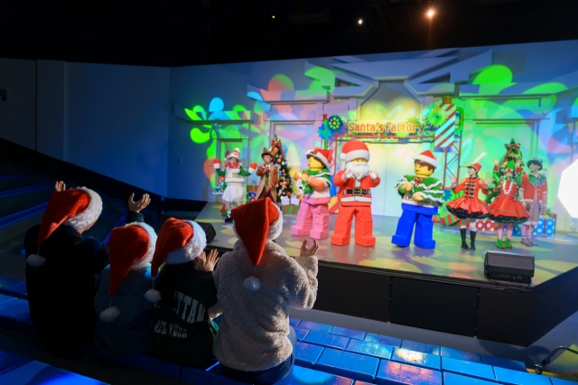 Visitors to Legoland Korea Resort enjoy the Christmas season musical performance, 