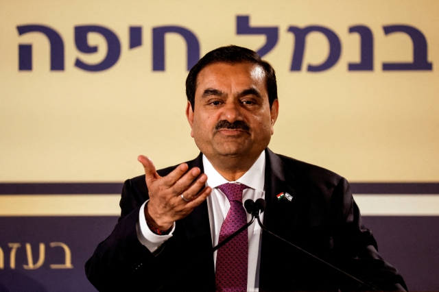 Indian billionaire Gautam Adani speaks during an inauguration ceremony after the Adani Group completed the purchase of Haifa Port earlier in January 2023, in Haifa port, Israel January 31, 2023. REUTERS/Amir Cohen/File Photo