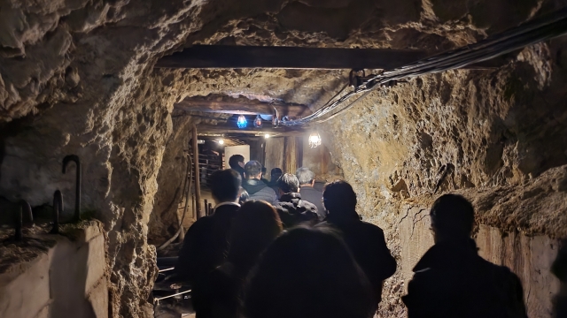 This photo, taken on Monday shows the bereaved family members of Korean victims of Japan's wartime forced labor at the Sado mine complex during the Japanese colonial rule exploring the interior of the Sado gold and silver mines on Sado Island, off Japan's west coast. (Yonhap)