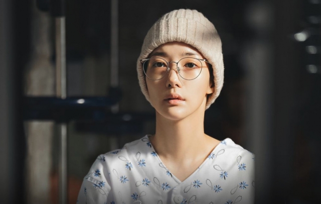 Actress Park Min-young plays a terminal cancer patient named Kang Ji-won in the tvN drama series titled 