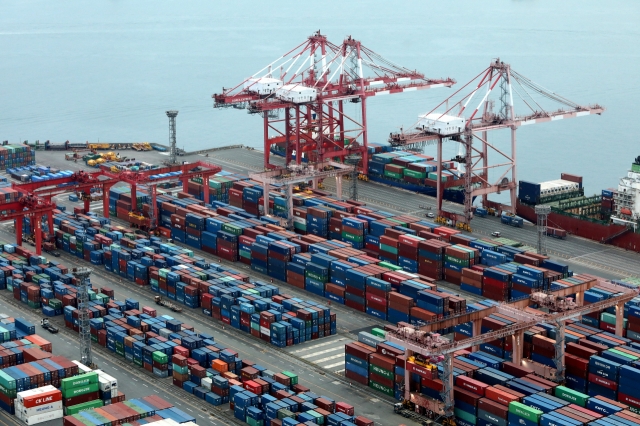 Shipping containers stacked in the container terminal at Busan Port in Busan. (Getty Images)