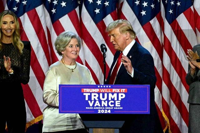 This photo, published by the Associated Press, shows United States President-elect Donald Trump (right), next to his chief of staff nominee Susie Wiles. (Yonhap)