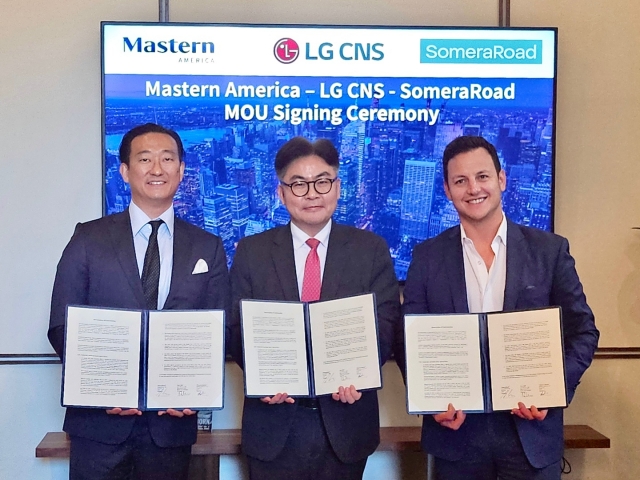 From left: Mastern America CEO Joseph Oh, LG CNS senior vice president Choi Moon-keun and SomeraRoad managing partner Ian Ross pose for a photo after signing a trilateral memorandum of understanding in New York. (LG CNS)