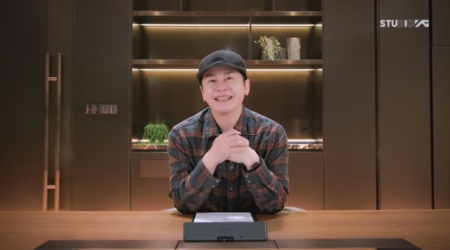 Yang Hyun-suk, executive producer at YG Entertainment, speaks of the company's 2025 plan in a video shared on its official blog, Monday. (YG Entertainment)